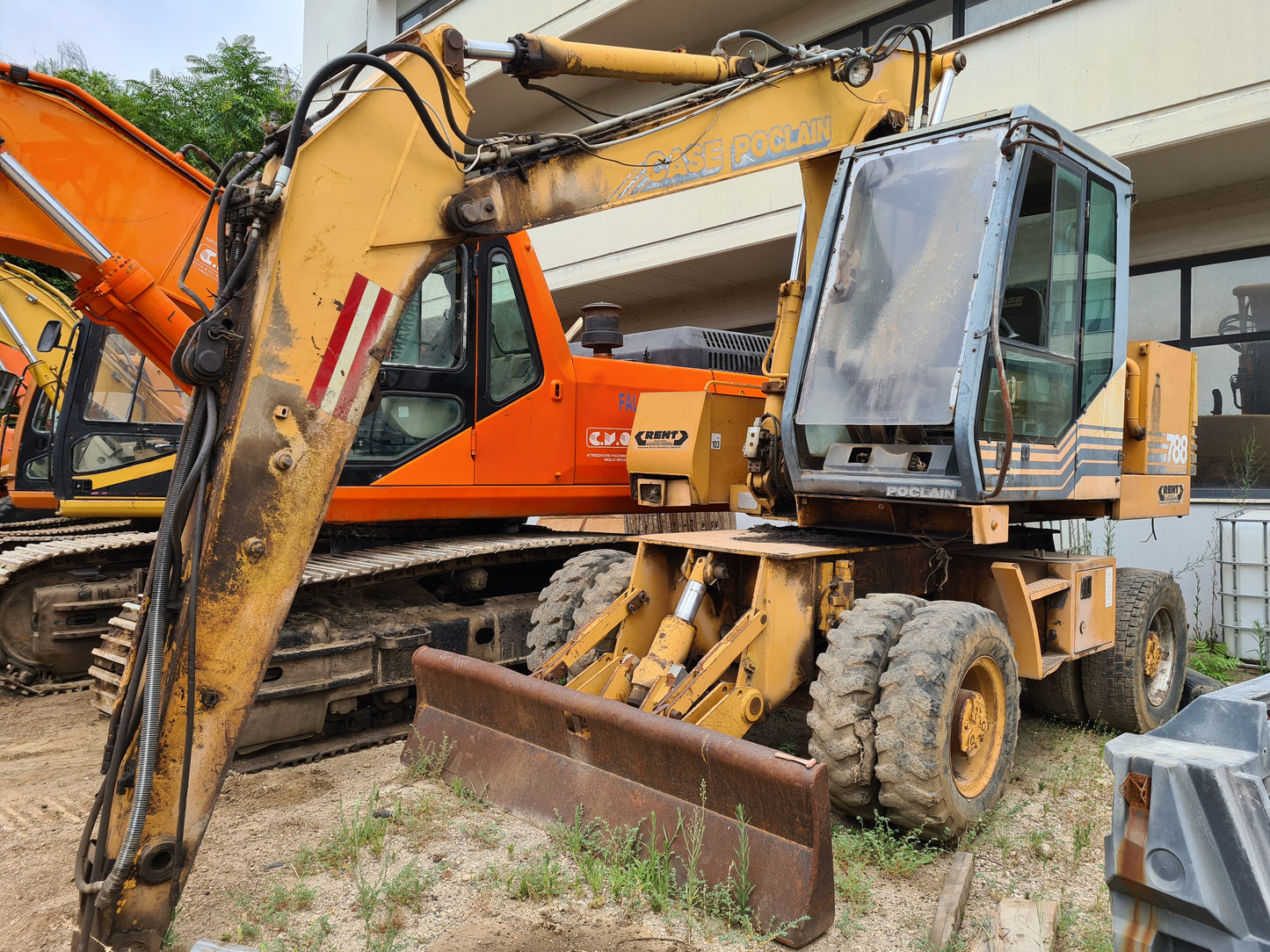 Escavatore gommato case proclain